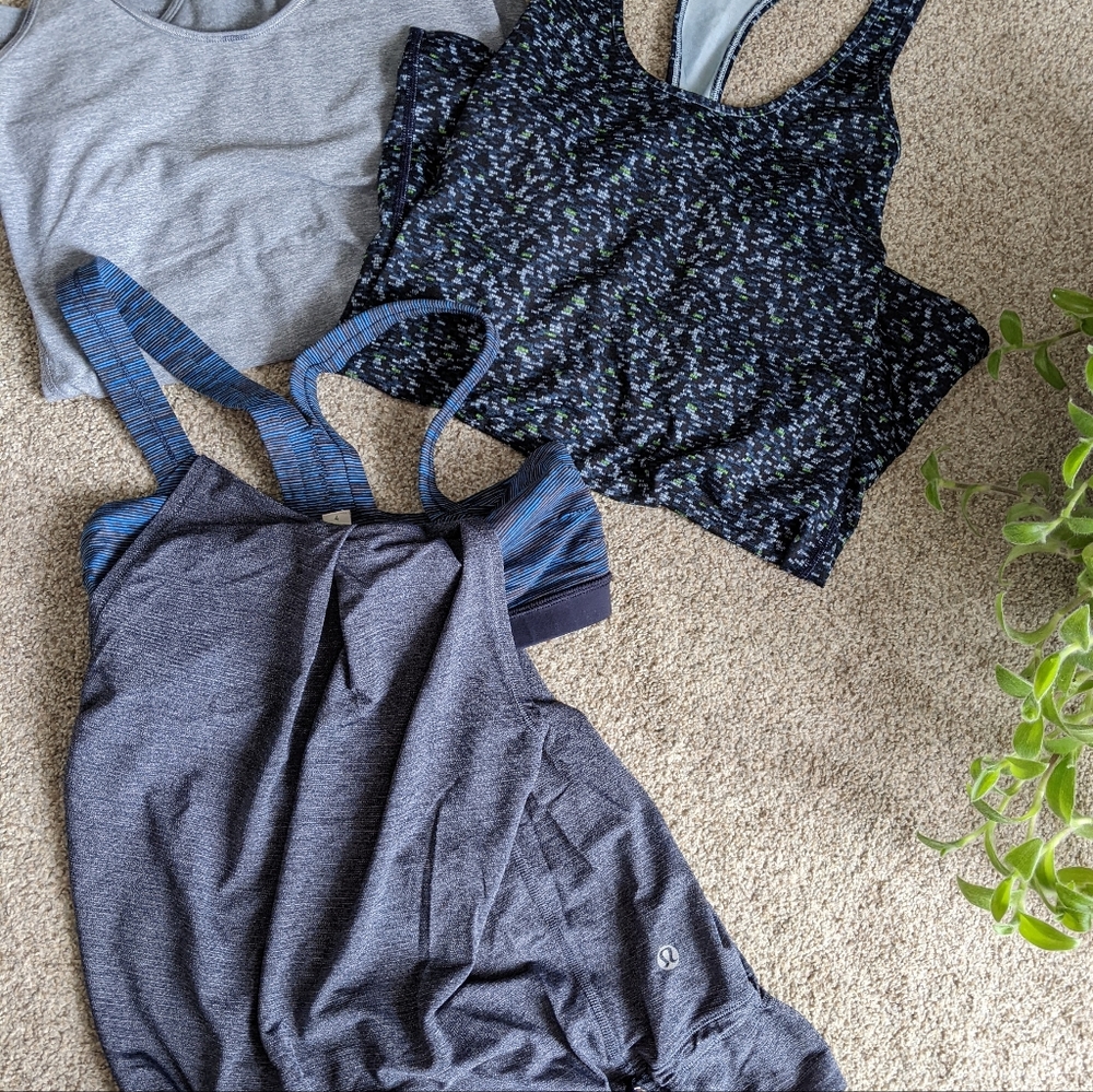 Set of Three Lululemon yoga tank tops.